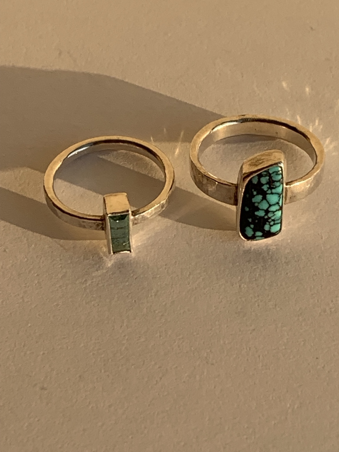 Two hand-fabricated rings with tourmaline and turquoise